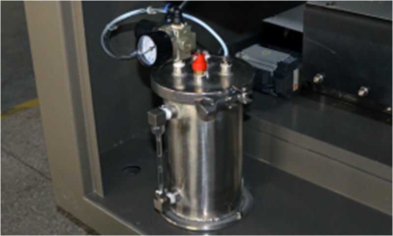 Pressure flux tank with regulating valve.jpg