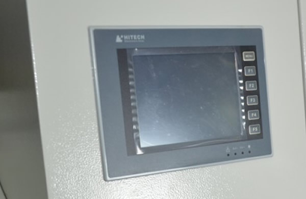 Touchscreen and PLC for controlling system